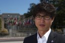 Shin Dong-hyuk poses after an interview with Reuters in Geneva