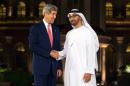 US Secretary of State John Kerry is greeted by United Arab Emirates Crown Prince Mohammed bin Zayed al-Nahyan at the Emirates Palace Hotel in Abu Dhabi, on November 10, 2013