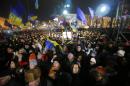 Demonstrators take to the streets in support of Ukraine's integration with the European Union in the center of Kiev, Ukraine, Thursday Nov. 28, 2013. As leaders of the European Union gather for a summit to discuss the bloc's eastern expansion, both EU and Ukrainian officials said Thursday that the suspension of talks on closer ties could still be revived after the two-day meeting. (AP Photo/Sergei Grits)
