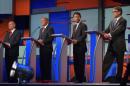 L-R: Republican presidential hopefuls Jim Gilmore, Lindsey Graham, Bobby Jindal and Rick Perry during the Republican presidential primary debate on August 6, 2015 in Cleveland, Ohio
