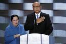 Khizr Khan, father of fallen US Army Capt. Humayun S. M. Khan and his wife Ghazala speak during the final day of the Democratic National Convention in Philadelphia , Thursday, July 28, 2016. (AP Photo/J. Scott Applewhite)