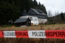 Police cordon off the area where body parts were found in Reichenau, eastern Germany, on November 29, 2013