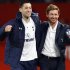 Tottenham Hotspur's manager Villas-Boas celebrates with Dempsey following their English Premier League soccer match against Manchester United at Old Trafford in Manchester