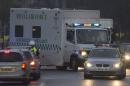 A convoy carrying an Ebola patient arrive at the Royal Free Hospital in London