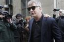 FILE - In this Tuesday, Nov. 12, 2013 file photo, actor Alec Baldwin leaves criminal court in New York. Baldwin testified that he never had a sexual or romantic relationship with Canadian actress Genevieve Sabourin, who is accused of stalking him. MSNBC says it has suspended Alec Baldwin's new weekly talk show for two episodes and didn't specify why. MSNBC's action followed an encounter Baldwin had with a photographer Thursday, Nov. 14, 2013, in New York in which the actor was heard on videotape using an anti-gay insult. (AP Photo/Seth Wenig, File)