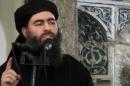This file image made from video posted on a militant website Saturday, July 5, 2014, which has been authenticated based on its contents and other AP reporting, purports to show the leader of the Islamic State group, Abu Bakr al-Baghdadi, delivering a sermon at a mosque in Iraq. On Sunday, Nov. 9, 2014, Iraqi officials and state television said al-Baghdadi has been wounded in an airstrike in western Iraq. An Interior Ministry intelligence official told The Associated Press on Sunday that the strike happened early Saturday in the town of Qaim in Iraq's Anbar province. (AP Photo/Militant video, File)