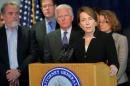 Maura Healey announces the state will join a lawsuit, along with plaintiffs Oxfam President Offenheiser and University of Massachusetts President Meehan, challenging U.S. President Donald Trump's executive order travel ban in Boston