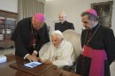 FILE - In this June 28, 2011 file photo, Pope Benedict XVI touches a touchpad to send a tweet for the launch of the Vatican news information portal "www.news.va", at the Vatican. The Vatican said Monday, Dec. 3, 2012, that Pope Benedict XVI will start tweeting in six languages from his own personal handle (at)Pontifex, on Dec. 12. The pontiff will be using a question and answer format in his first Tweet, focusing on answering questions about faith — in 140 characters. (AP Photo/Osservatore Romano, File) EDITORIAL USE ONLY