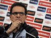 File photograph shows England's manager Fabio Capello listening during a news conference at Wembley stadium in London