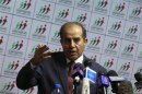 Mahmoud Jibril, head of the National Forces Alliance, talks during a news conference at his headquarters in Tripoli
