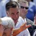 Republican presidential candidate, former Massachusetts Gov. Mitt Romney greets supporters following a campaign stop in Council Bluffs, Iowa, Friday, June 8, 2012. (AP Photo/Nati Harnik)