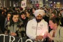 An Indian man and Irish woman light candles as abortion rights protesters march through central Dublin Saturday, Nov. 17, 2012, demanding that Ireland's government create a law defining when abortions can be performed to save a woman's life. Ireland has been shocked by the death of Savita Halappanavar, a 31-year-old Indian dentist who died of blood poisoning after being denied an abortion in a Dublin hospital last month. (AP Photo/Shawn Pogatchnik)