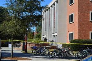 Crime scene tape is seen in front of the library at &hellip;