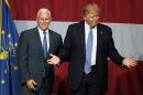 Indiana Governor Mike Pence (L) is Donald Trump's (R) running mate in the US presidential election