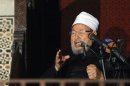 Egyptian Cleric Sheikh Yusuf al-Qaradawi, chairman of the International Union of Muslim Scholars, gives a speech during Friday prayers, before a protest against Syrian President Bashar al-Assad, at Al Azhar mosque in old Cairo