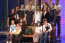 Then 55-old Annegret Raunigk (1st row, 2ndL), posing with her children and grand-children in Cologne, Germany, as a guest in the RTL show "2005! People, Photos, Emotions", on December 11, 2005