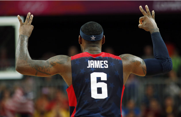 James of the U.S. celebrates after a made three-point basket against Lithuania during their men&#39;s preliminary round Group A basketball match at the Basketball Arena during the London 2012 Olympic 
