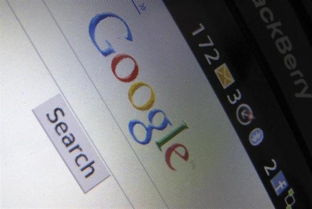 A Google Inc page is shown on a blackberry phone in Encinitas, California April 13, 2010. REUTERS/Mike Blake/Files