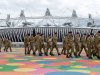 Members of the armed forces walk through the Olympic Park in east London