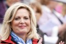 Ann Romney, wife of U.S. Republican presidential candidate Mitt Romney, applauds as her horse Rafalca ridden by Jan Ebeling competes in the equestrian dressage individual grand prix special at the London 2012 Olympic Games in Greenwich Park