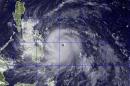 This image provided by the U.S. Naval Research Lab shows Typhoon Haiyan taken by the NEXSAT satellite Thursday Nov. 7, 2013 at 2:30 a.m. EDT. Gorvernment forecasters said Thursday that Typhoon Haiyan was packing sustained winds of 215 kilometers (134 miles) per hour and ferocious gusts of 250 kph (155 mph) and could pick up strength over the Pacific Ocean before it slams into the eastern Philippine province of Eastern Samar on Friday. (AP Photo/US Naval Research Lab)