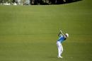 Rory McIlroy, of Northern Ireland, prepares to hit on the eighth fairway during the third round of the Masters golf tournament Saturday, April 12, 2014, in Augusta, Ga. (AP Photo/Chris Carlson)
