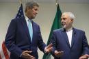 FILE - In this Sept. 26, 2015 file photo, Secretary of State John Kerry meets with Iranian Foreign Minister Mohammad Javad Zarif at United Nations headquarters. Congressional Republicans are criticizing the Obama administration over its reassurances to Iran about new visa rules. At issue is a new law tightening visa-free travel to the U.S. The measure was part of a spending bill passed by Congress last week and signed by President Barack Obama. It requires visas for citizens of Iraq, Syria, Iran and Sudan, as well as recent visitors to those countries. (AP Photo/Craig Ruttle, File)