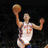 FILE - In this Feb. 4, 2012, file photo, New York Knicks' Jeremy Lin drives to the basket during the second quarter of an NBA basketball game New Jersey Nets at Madison Square Garden in New York. Linsanity could be put to rest in New York when the clock strikes midnight. That's the deadline the Knicks face to match the daunting offer the Houston Rockets have made to Lin, the Harvard point guard who dazzled all of basketball for a brief stretch last season. (AP Photo/Bill Kostroun, File)