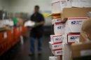 United States Postal Service clerks sort mail at the USPS Lincoln Park carriers annex in Chicago
