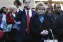 In this Wednesday, Jan. 22, 2014, photo, job seekers line up to meet prospective employers during a career fair at a hotel in Dallas. The government issues the January jobs report on Friday, Feb. 7. 2014. (AP Photo/LM Otero)