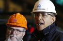 U.S. President Obama wears a helmet as he tours the U.S. Steel Irvin Plant in West Mifflin