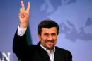 Iran's President Mahmoud Ahmadinejad gestures as he leaves a news conference in Istanbul