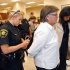 Forsyth County sheriff's deputies arrest Mary Lee Bradford of Winston-Salem and Mary Jamis of Mocksville after they refused to leave at the Forsyth County Register of Deeds office in Winston-Salem, N.C., Thursday, May 10, 2012. The two women staged a sit in at the office after some couples were refused a marriage license because they were gay or lesbian. (AP Photo/Bob Leverone)