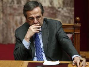 Greece's Prime Minister Samaras reacts during the second of three rounds of a presidential vote at the Greek parliament in Athens
