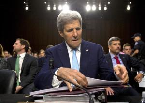 Secretary of State John Kerry settles into his seat &hellip;