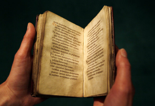 The St. Cuthbert Gospel, the earliest intact European book, created in the 7th century, is displayed at the British Library in London, Thursday, July 14, 2011. The British Library launched a campaign on Thursday to try to raise the final 2.75 million pounds (4.43 US Dollars) to buy the book. (AP Photo/Kirsty Wigglesworth)