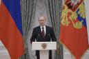 Russian President Putin speaks during an awards ceremony in Moscow's Kremlin