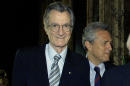 In this Thursday, June 14, 2007 file photo released by the Italian Presidency Press office, Italian filmmaker Carlo Lizzani, left, attends a ceremony at the Quirinale Presidential palace in Rome. Lizzani, a protagonist of Italian Neorealism, has died in Rome, Saturday, Oct. 5, 2013 at age 91. Lizzani died after a fall from the third-floor balcony of his home in Rome, and that authorities were investigating whether it was a suicide. Lizzani started out as a film critic, then as a writer on such seminal films as Roberto Rossellini's 1948 "Germany Year Zero" and Giuseppe De Santis' 1950 film "Bitter Rice," which earned him an Oscar nomination. The Academy of Italian Cinema awarded him best director for his 1968 film "The Violent Four," and best screenwriter for the 1996 film "Celluloide."(AP Photo/Enrico Oliverio,Italian Presidency Press office, File)