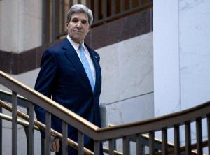 Secretary of State John Kerry walks to a meeting with …