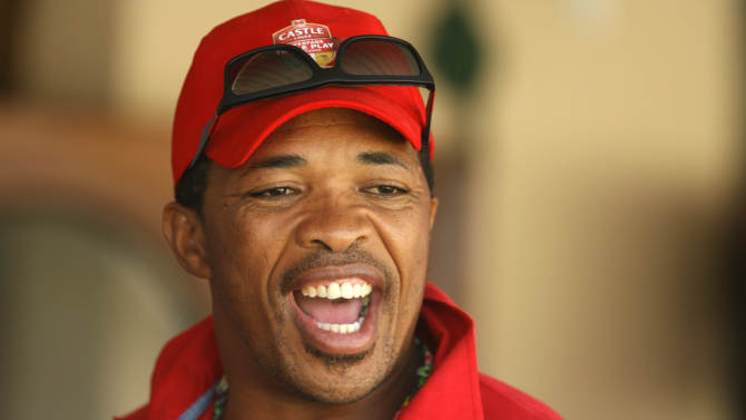 South Africa&#39;s bowler Makhaya Ntini cheers for his team during a one day match against South Africa at the Harare Sports Club on August 27, 2014