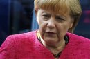 German Chancellor Merkel frowns during a visit to technology company Trumpf in Ditzingen