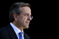 <p>               Greek Prime Minister Antonis Samaras waits the arrival of  Lebanese President Michel Suleiman  in Athens, Thursday, Dec. 6, 2012. Greece's is finalizing a major tax reform bill, demanded by international rescue creditors as one of several conditions for continued payments. Greece's conservative-led government has promised to try and stem the country's punishing recession, but last month introduced another round of austerity measures. New unemployment figures, released Thursday, showed the country's jobless rate rising to 26 percent in September.  (AP Photo/Petros Giannakouris)