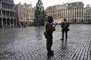 Soldiers patrol at the Grand Place square, in Brussels, on November 24, 2015 as city-wide patrols of armed soldiers and police seek to ward off a threat the government said "remains serious and imminent"