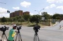 Members of the media are seen outside the One Military Hospital, which former South African President Mandela was previously admitted, in Pretoria