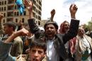 Supporters of Shiite Zaidi rebels chant slogans during a demonstration calling for the government to resign on August 29, 2014, in the capital Sanaa
