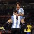 Argentina's Messi celebrates with teammate Higuain after he scored a goal against Ecuador during a World Cup qualifying soccer match in Buenos Aires