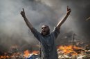 AP10ThingsToSee - A supporter of ousted Islamist President Mohammed Morsi shouts during clashes with Egyptian security forces in Cairo's Nasr City district, Egypt, Wednesday, Aug. 14, 2013. (AP Photo/Manu Brabo, File)