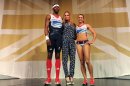 British athletes triple jumper Phillips Idowu (L) and heptathlete Jessica Ennis (R) pose with designer Stella McCartney (C)in the Olympic Team GB kit she designed.
