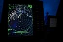 A navigational radar on Indonesia's National Search and Rescue boat shows details during a search in the Andaman sea area around northern tip of Indonesia's Sumatra island for the missing Malaysian Airlines flight MH370 on March 17, 2014
