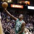 Boston Celtics' Jeff Green (8) goes to the basket as Utah Jazz's DeMarre Carroll (3) and Enes Kanter (0) defend in the second quarter during an NBA basketball game, Monday, Feb. 25, 2013, in Salt Lake City. (AP Photo/Rick Bowmer)